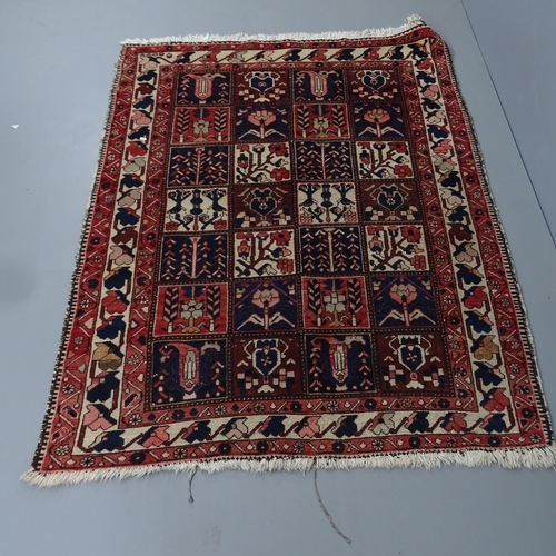 2313 - A hand knotted Bakhtiar garden carpet, approximately 80 years old. 195x148cm