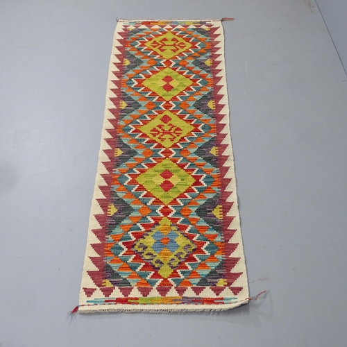 2321 - A Chobi Kilim runner. 198x62cm