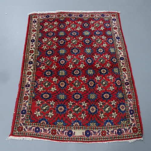 2324 - A hand knotted Veramin rug, circa 1940 of Mina Khani design. 136x105cm