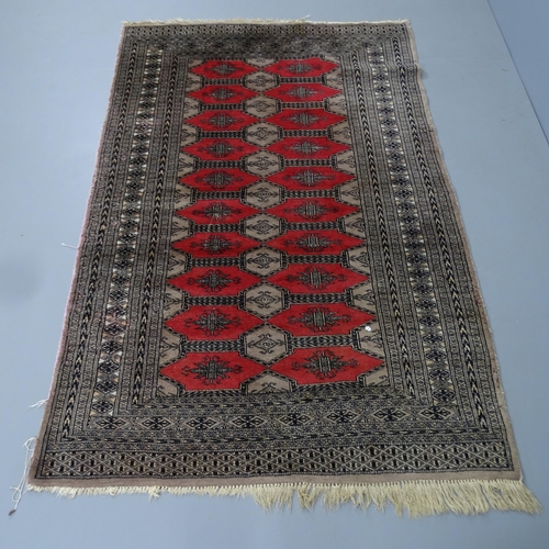 2325 - A cream-ground silk Buchara rug. 194x126cm