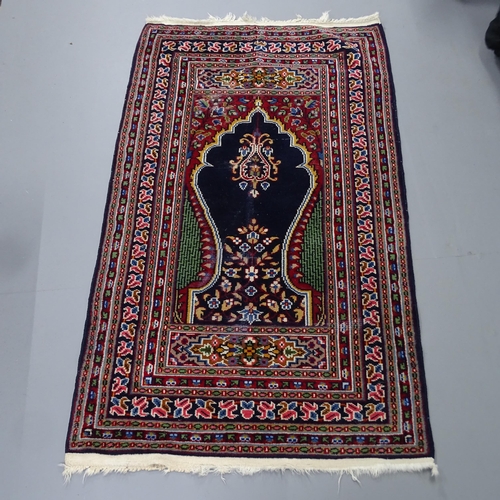 2326 - A blue-ground Persian design-prayer rug. 133x78cm.