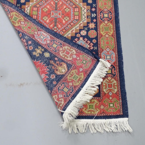 2331 - A hand-knotted Caucasian runner. 147x63cm