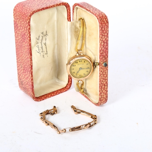 1221 - LEETS of JON - a lady's 9ct gold cased wristwatch, with brass crown and plated strap, and a separate... 