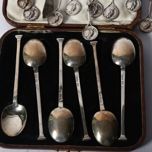 1229 - A cased set of 6 Edward VII silver teaspoons, a set of 10 silver teaspoons with bowling motif finial... 