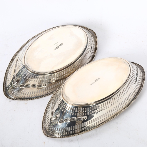 1246 - A pair of Elizabeth II pierced silver boat-shape dishes, length 19cm, hallmarks for Sheffield 1974, ... 