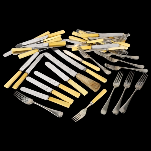 1101 - A quantity of ivorine-handled table knives, Old English pattern forks etc