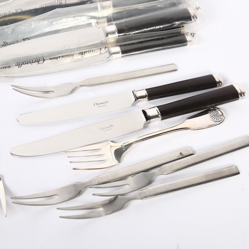 1107 - A set of 9 Christofle (France) dinner knives, with ebene handles, together with a matching set of 10... 