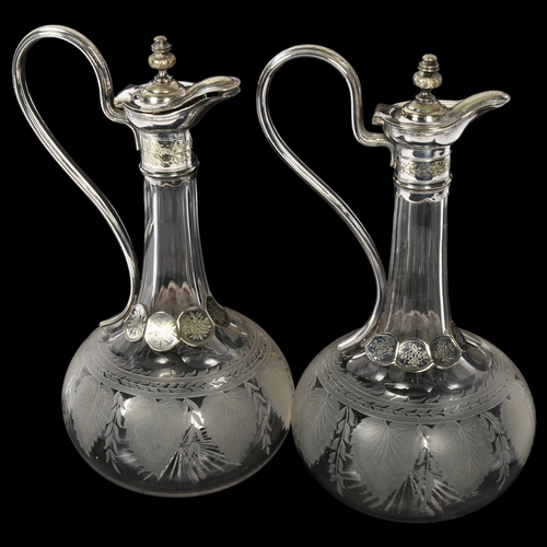 1116 - * Description amended*A pair of Edwardian cut-glass and silver plate-mounted decanters, with swan-ne... 