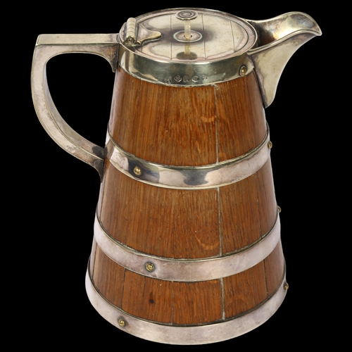 1117 - An Edwardian coopered oak water/ale jug with silver plated mounts, overall height 21cm