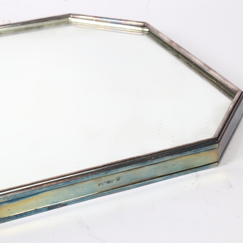 1118 - CHRISTOFLE - an octagonal silver plated serving tray with inset mirrored top, width 30.5cm (1 foot m... 