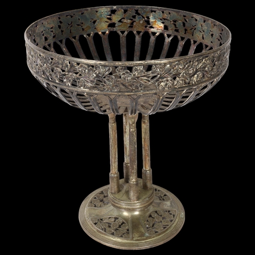 1121 - A large German Art Nouveau silver plated tazza centre piece, with pierced and relief cast floral bor... 