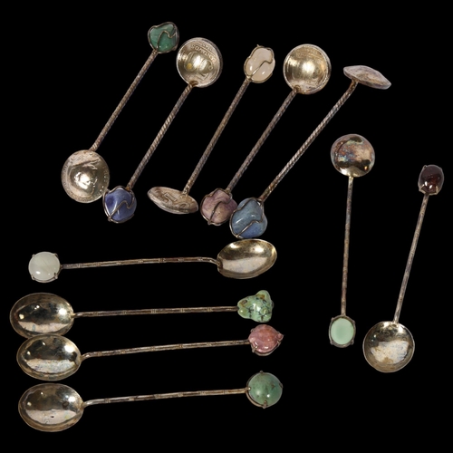 1127 - A cased set of 6 unmarked silver coffee spoons, with stone set handles, a cased set of spoons with c... 