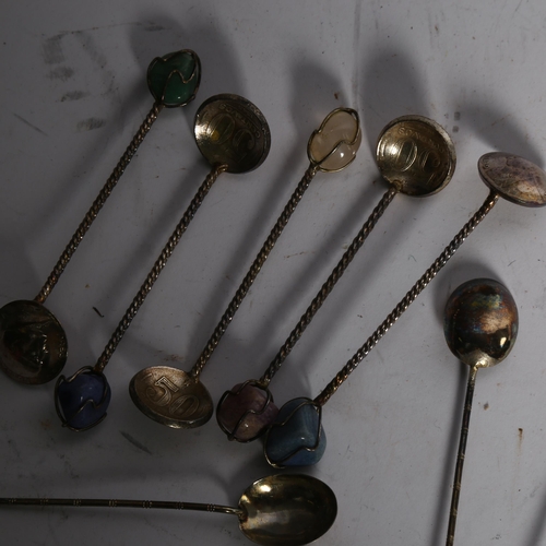 1127 - A cased set of 6 unmarked silver coffee spoons, with stone set handles, a cased set of spoons with c... 