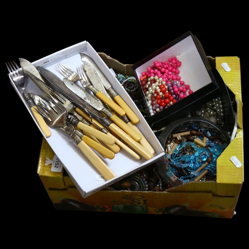 1152 - A large box of mixed modern costume jewellery, and fish service with ivorine handles for 6 people