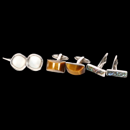 1161 - A pair of tigers eye set cufflinks, a pair of mother-of-pearl set cufflinks, and a pair of abalone s... 