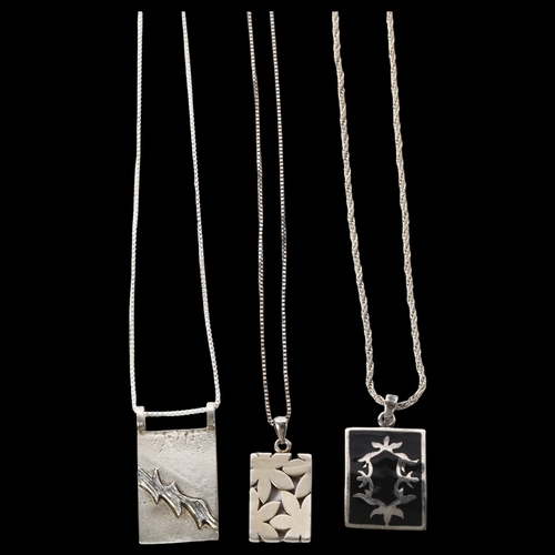 1166 - A group of 3 silver necklaces with abstract design pendants