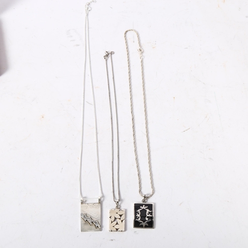 1166 - A group of 3 silver necklaces with abstract design pendants