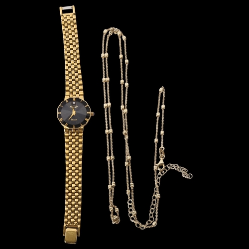 1183 - A lady's gold plated Rotary wristwatch, and an Italian 925 silver guard chain (2)