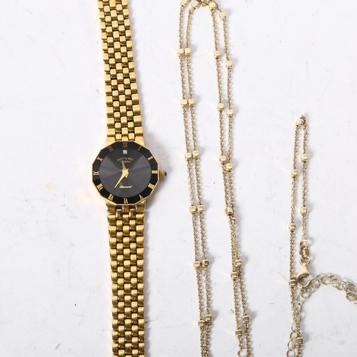 1183 - A lady's gold plated Rotary wristwatch, and an Italian 925 silver guard chain (2)