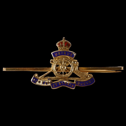 1189 - A 9ct gold Royal Artillery sweetheart brooch, with enamelled crown, length 50mm, 4.4g