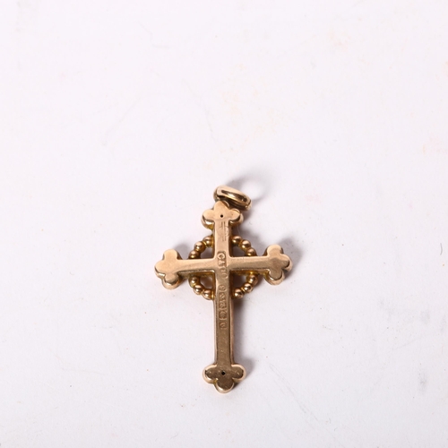 1193 - A 9ct gold engraved cross, maker's marks for Carrington & Company, 1.4g