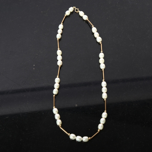 1197 - A 9ct gold and cultured pearl necklace, length 43cm