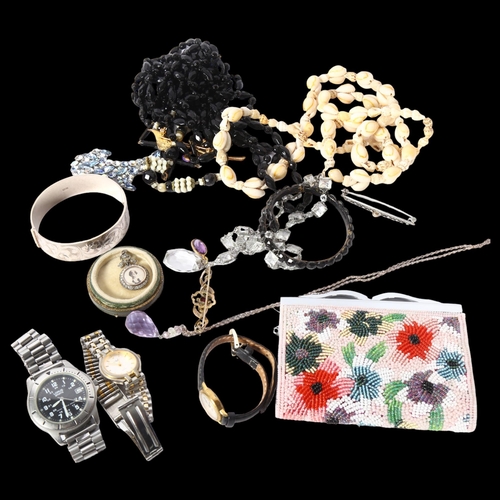 1198 - A collection of mixed costume jewellery, to include an engraved silver bangle, a silver and stone se... 