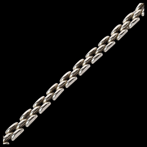 1205 - A Continental silver gatelink design bracelet, length 21cm, marked 900