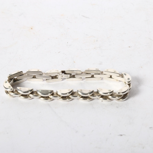 1205 - A Continental silver gatelink design bracelet, length 21cm, marked 900