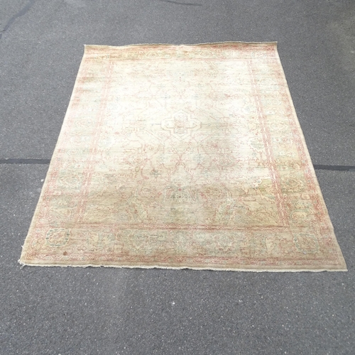 2343 - A cream ground Persian design carpet. 300 x 250cm.