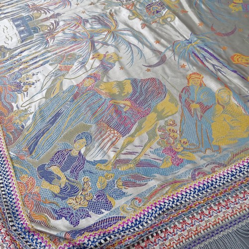 2349 - A machine-made colourful throw depicting camels and figures, 200 x 174cm