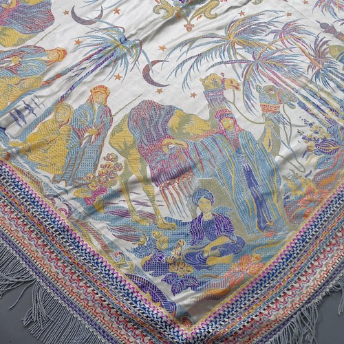 2349 - A machine-made colourful throw depicting camels and figures, 200 x 174cm