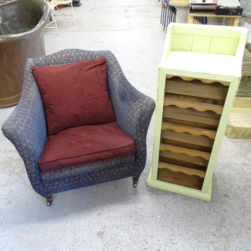 2747 - A green painted pine wine rack, 36x96x26cm, and an upholstered tub chair (2).