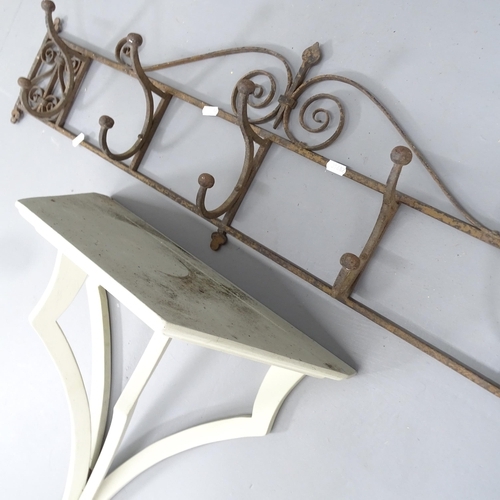 2201 - A vintage wrought iron hat and coat rack, 100x30cm And a painted wall bracket, 45x60x24cm (2).