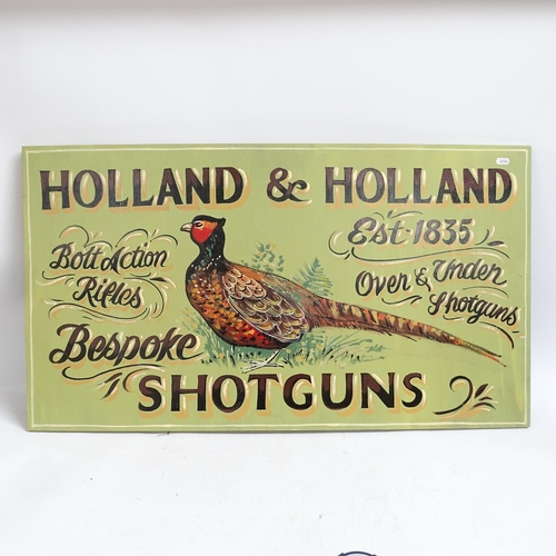 1070 - A hand painted wooden sign advertising 'Holland & Holland Shotguns', length 97cm.