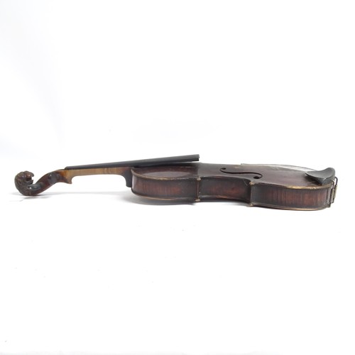 528 - A Victorian violin, with carved lionhead scroll, and horsehair bow, in hardshell case, violin is in ... 