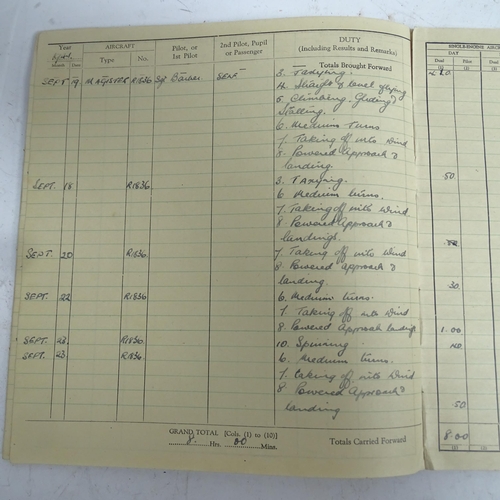 384 - A Second World War Period Royal Air Force pilot's flying logbook, relating to 1335697 Flight Sargent... 