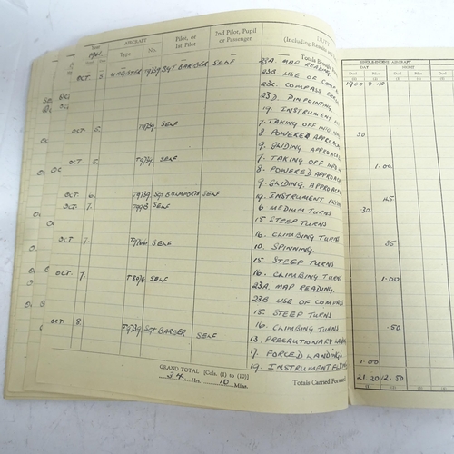 384 - A Second World War Period Royal Air Force pilot's flying logbook, relating to 1335697 Flight Sargent... 