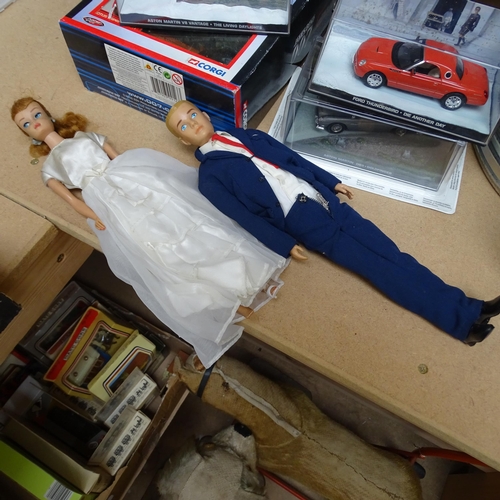 164 - BARBIE - a Barbie doll and a Ken doll, by Mattel, and a quantity of clothing and accessories