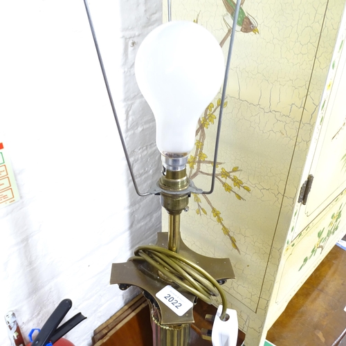 2022 - A 19th Century brass Corinthian column standard lamp on pedestal base. Height to bayonet 138cm.