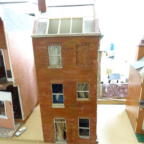 230 - A Vintage doll's house in the style of a townhouse, spread over 3 floors with fitted interior, inclu... 