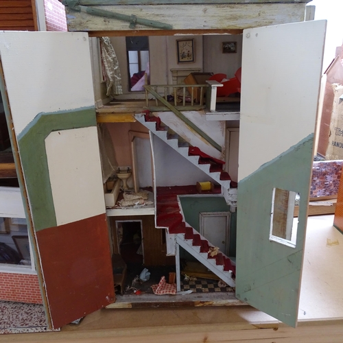 230 - A Vintage doll's house in the style of a townhouse, spread over 3 floors with fitted interior, inclu... 