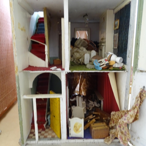 230 - A Vintage doll's house in the style of a townhouse, spread over 3 floors with fitted interior, inclu... 