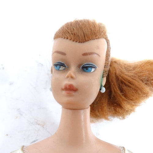 164 - BARBIE - a Barbie doll and a Ken doll, by Mattel, and a quantity of clothing and accessories