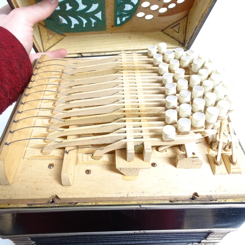 523 - ALFRED ARNOLD - a German bandoneon, bearing the maker's plaque of Alfred Arnold, enclosed within a h... 