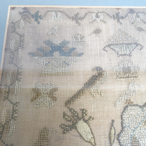 609 - A Regency Period cross-stitch sampler by Charlotte Brindley aged 8 years, 1813, with design of flowe... 