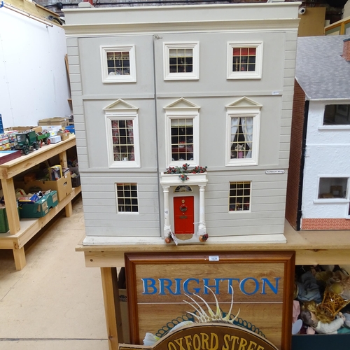 228 - A Regency style doll's house, titled Harbour Wynd, over 3 floors with fitted interior, includes vari... 