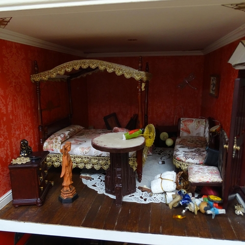 228 - A Regency style doll's house, titled Harbour Wynd, over 3 floors with fitted interior, includes vari... 