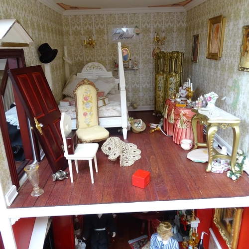 228 - A Regency style doll's house, titled Harbour Wynd, over 3 floors with fitted interior, includes vari... 