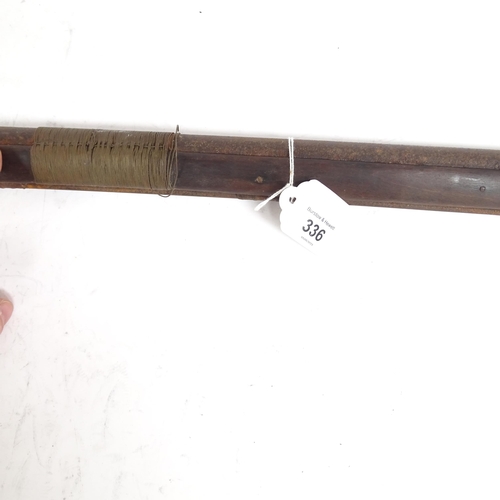 336 - A flintlock rifle, length 157cm